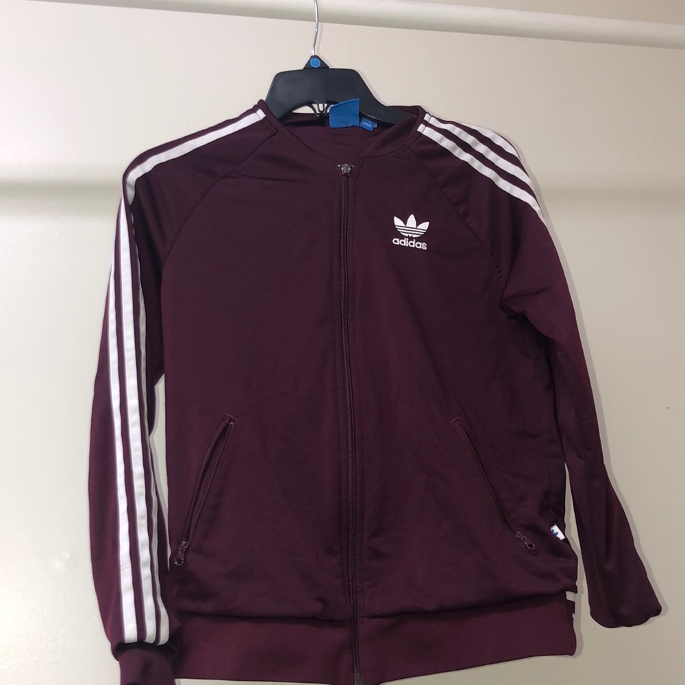 Maroon women’s Adidas track jacket